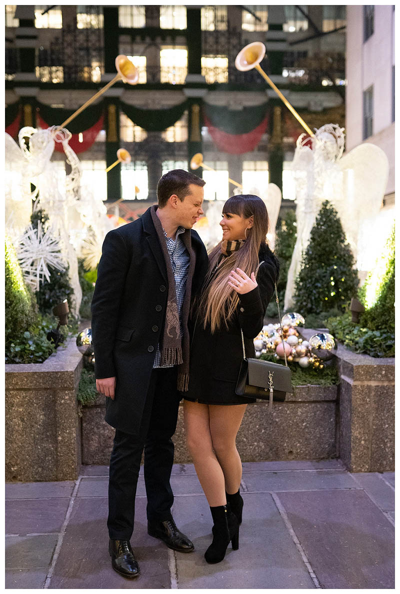 Joyful couple gets engaged at Rockefeller Center in NYC